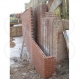 Reinforced cavity brick retaining wall